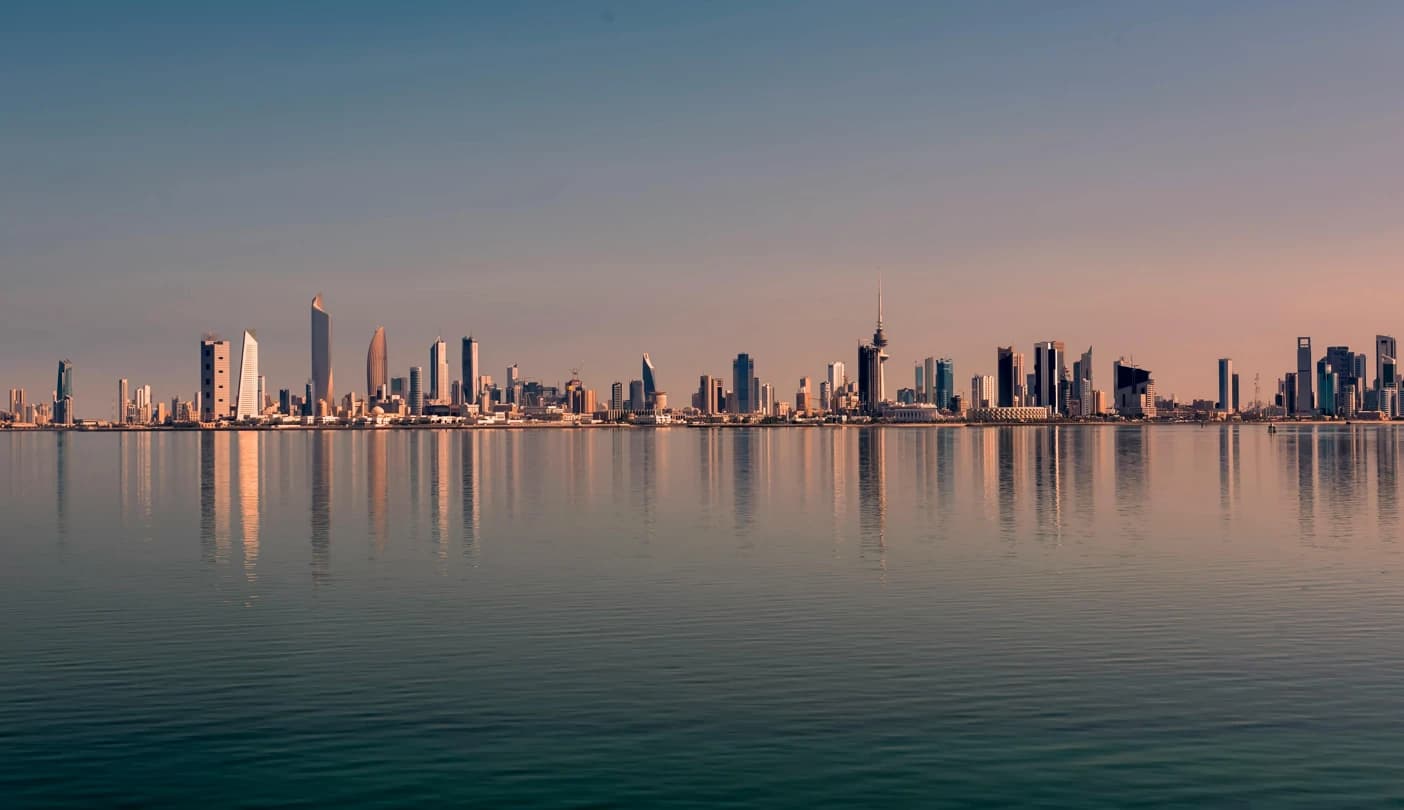 Kuwait visit visa from Qatar and Kuwait City skyline